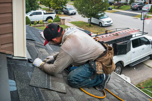 Professional Roofing technician working in Kingston, IL